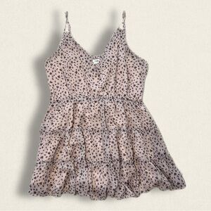 blush romper with flower details